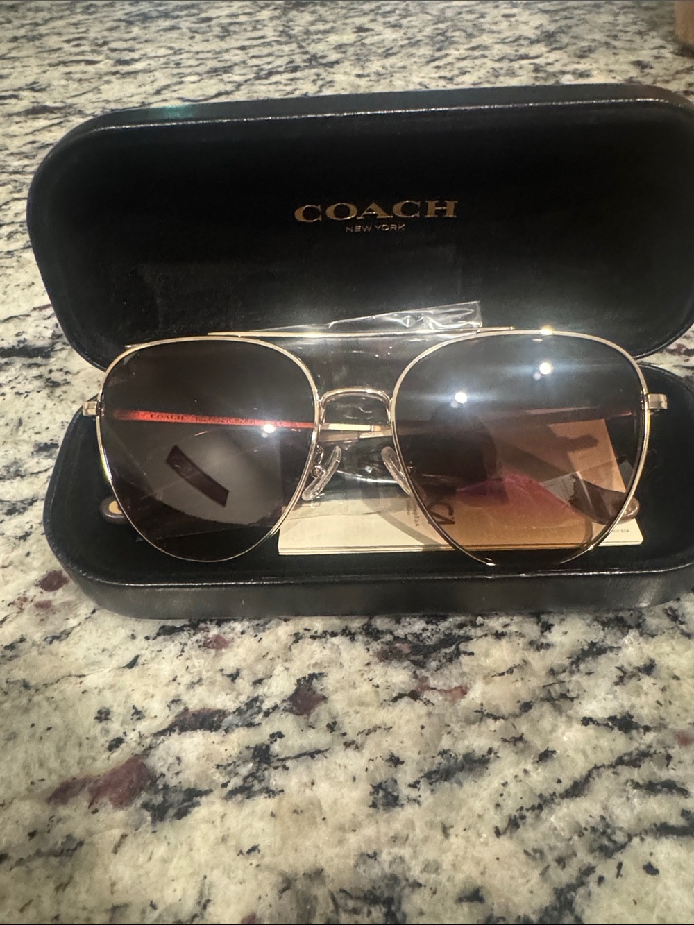 Coach women’s aviator sunglasses